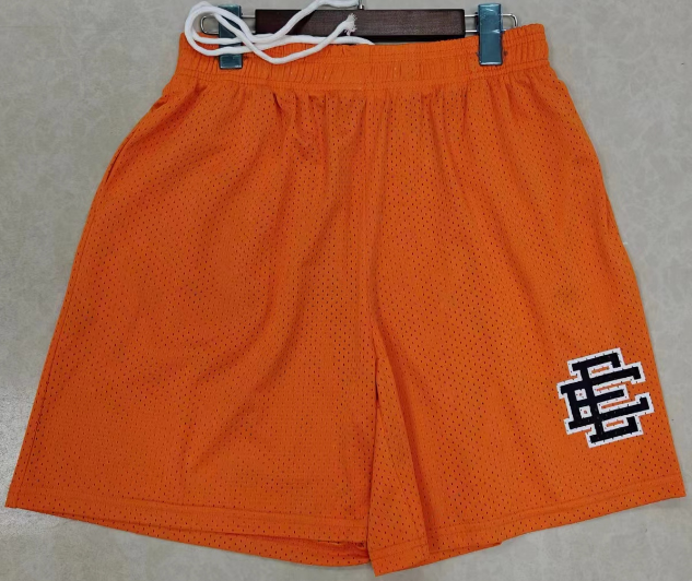 Eric Emanuel Men’s Shorts – Orange Mesh Basketball Shorts with Iconic EE Branding