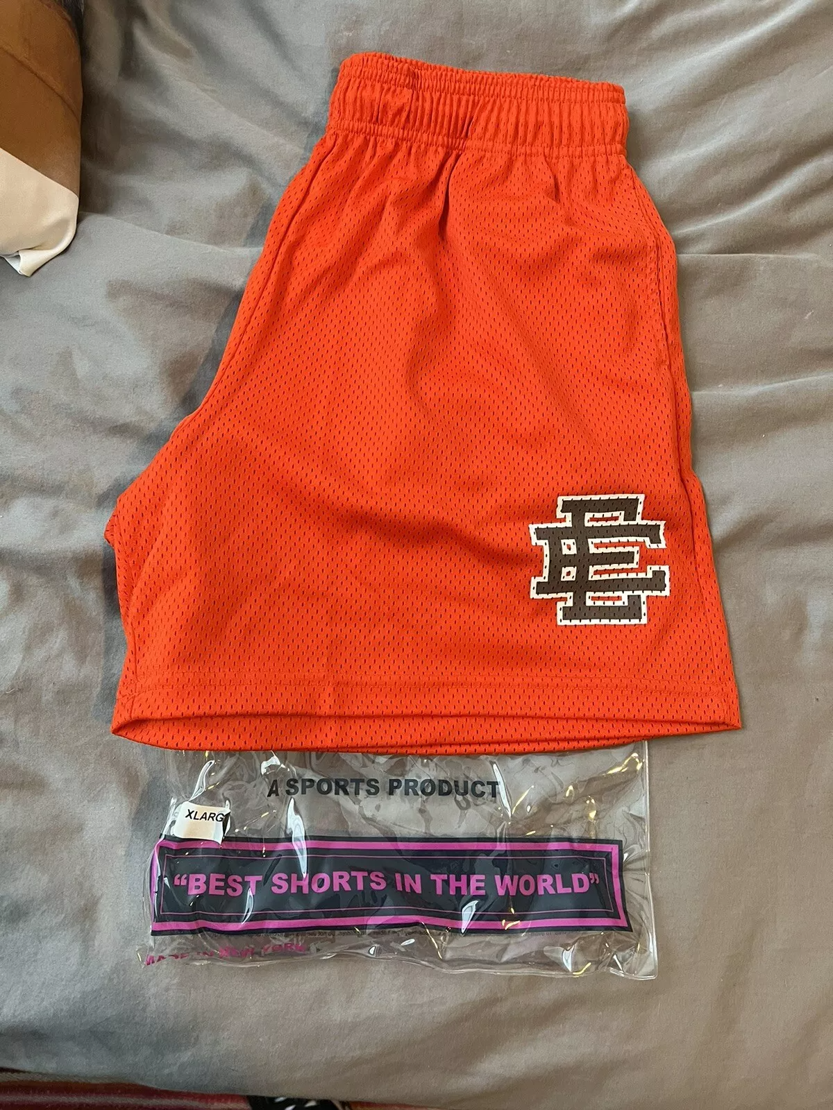 Eric Emanuel Men’s Shorts – Orange Mesh Basketball Shorts with Iconic EE Branding